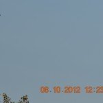An actual UFO sighting at Mount Rushmore turned out to be the Aero Spacelines Super Guppy which is a large wide-bodied cargo aircraft. Not quite sure why it made an appearance  over Rushmore when I was there, but I was able to capture a "zoomed in" picture of it and able to identify what people were pointing at.